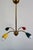 Spider or Sputnik chandelier dating from the 1960s. Brass frame and four painted metal reflectors. Very slight signs of...