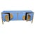 Contemporary Italian four-door sideboard handcrafted in 2026 with glossy cornflower-blue Murano glass, polished brass...