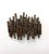 A sculptural vintage wall hanging composed of densely layered, torch-cut metal tubes arranged in an irregular vertical...