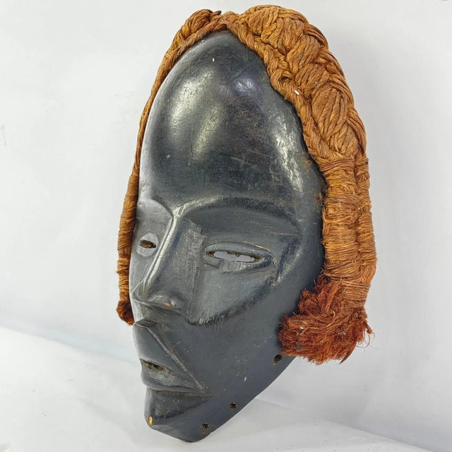 Dan masks, originating from the Dan people of Liberia, CÃ´te d'Ivoire, and Guinea, are recognized for their elongated...