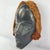 Dan masks, originating from the Dan people of Liberia, CÃ´te d'Ivoire, and Guinea, are recognized for their elongated...