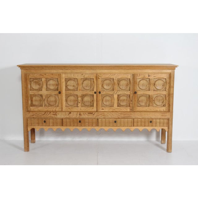 Sideboard by designer Henning Kjærnulf. Most likely manufactured by the Danish company Nyrup Møbelfabrik/ EG Furniture,...