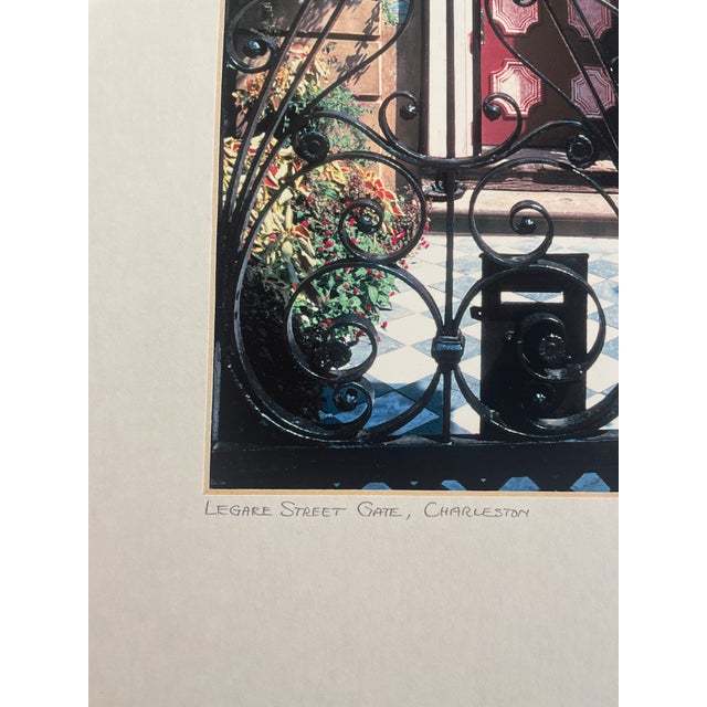 1990s photograph by Charleston photographer Ron Rocz, signed on mat lower right, titled "Legare Street Gate, Charleston,"...