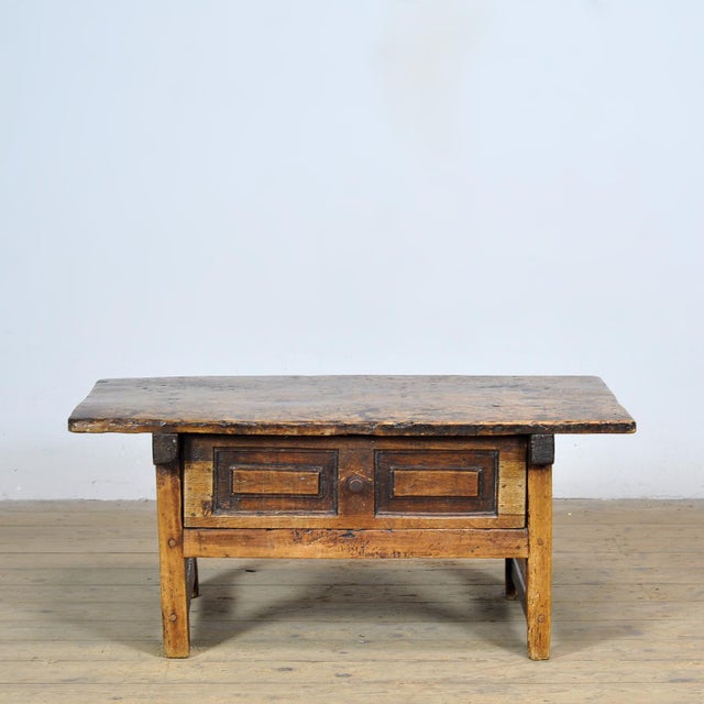 This authentic Spanish table, crafted from solid chestnut wood, dates from the late 17th or early 18th century and...