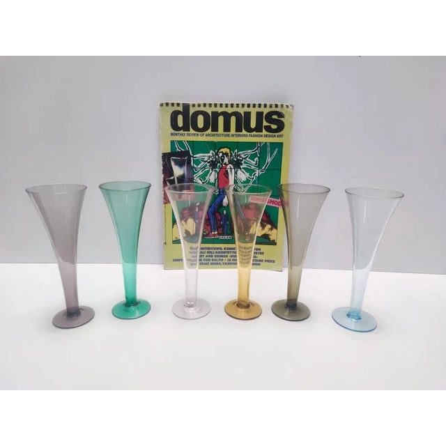 Made in Italy, 1950s. These flutes are made in very thin hand-blown Murano glass. They can also be use as flower vases....