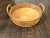 Beautiful oversized vintage round rattan tray featuring a tightly coiled base, open woven cane sides, substantial rounded...