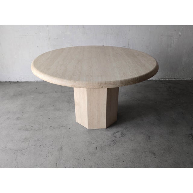 This gorgeous 4ft round Italian Travertine dining table from the 80s is incredible. The rarely seen, thick, bullnosed top...