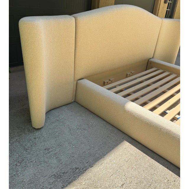 2025 Collection Caracole Luna Winged Panel Bed Cream Boucle Fabric Designed to be the signature piece of a bedroom, this...