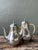 This elegant pair of vintage coffee pots masterfully blends mid-century industrial polish with organic, coastal textures....