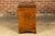 An English walnut Campaign butler's desk from the 19th century with writing area, three drawers, bracket feet and brass...