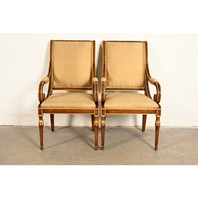 An outstanding pair of French Regency Louis XVI or Neoclassical style armchairs or dining captain chairs By Karges...