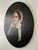 Antique mid-19th century American, large oval, oil on canvas Portrait of a Woman. This carefully executed painting...