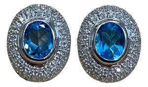 5 Carat Oval Shape Blue Topaz and Diamond Omega Back Clip Earring 14 Karat Gold