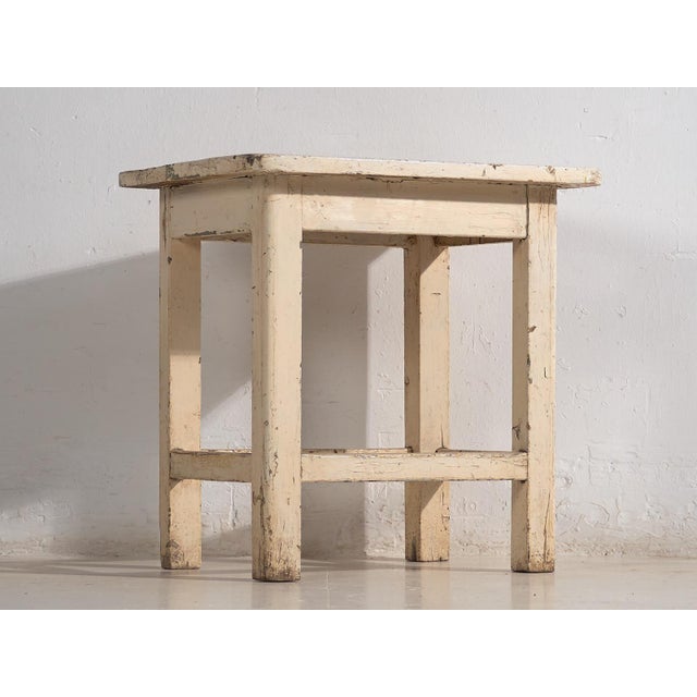 Antique white solid pine wood table (c.1920) Approximate age: 100 years Material: Pinewood Our antique white table is a...