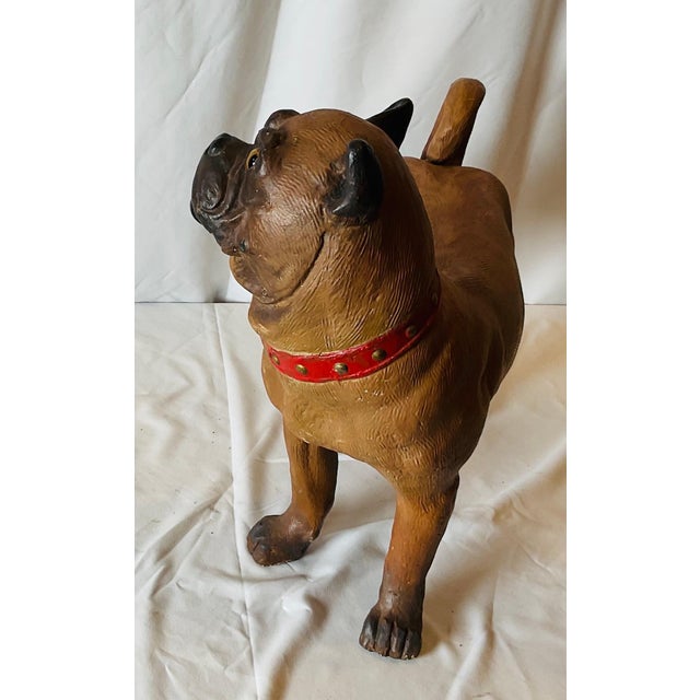 A whimsical Hand painted English terra-cotta pug dog sculpture, circa 1880. The pieces where the rage in the 19th century...