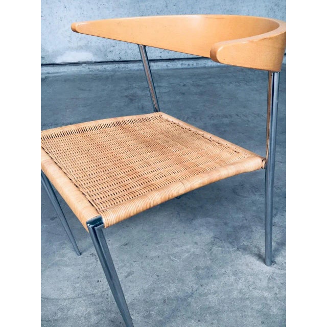 Postmodern Modern Design Dining Chair by BBB Bonacina, Italy 1990s. Steer head bent pressed wood back with rattan seat on...
