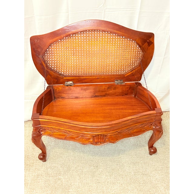 Petite in scale but rich in detail with masterful blend of elegance and utility, this vintage carved wood table offers...