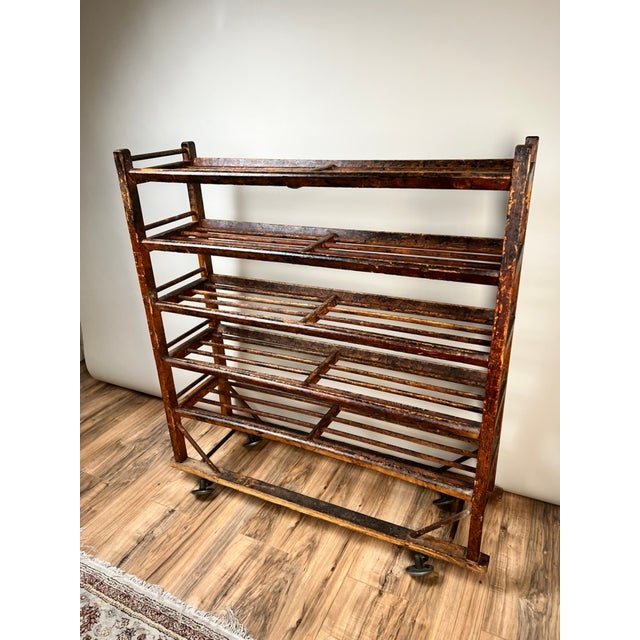This fascinating late 19th century industrial rolling rack is a wonderful survivor from the American shoe manufacturing...