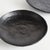 This pair of handcrafted bowls has simple round silhouettes, with a matte finish and subtle texture. They can be styled...