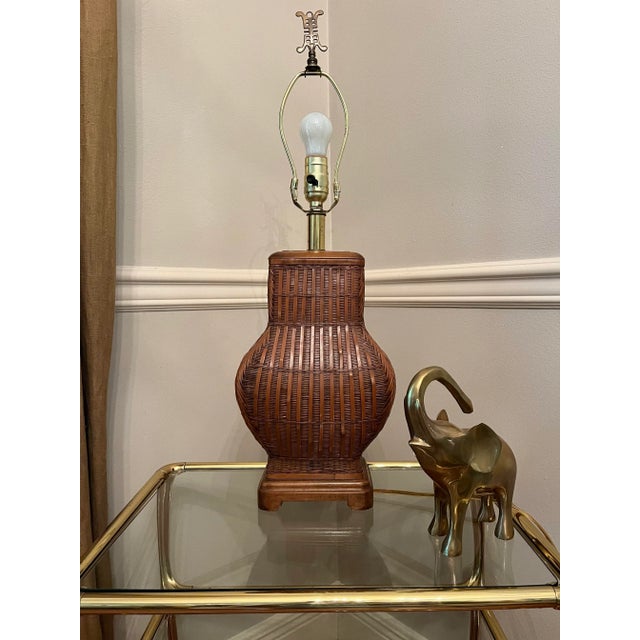 This Japanese Ikebana lamp was originally a vase dating to the early 20th century. Very intricately woven. In the 1980’s...