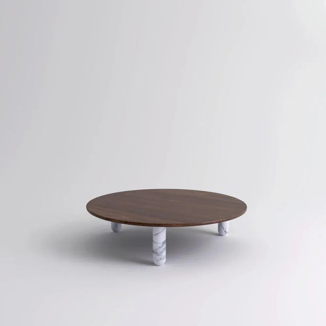 Large round walnut and white marble "sunday" coffee table, jean-baptiste souletie dimensions: 150 d x 35 h cm materials:...