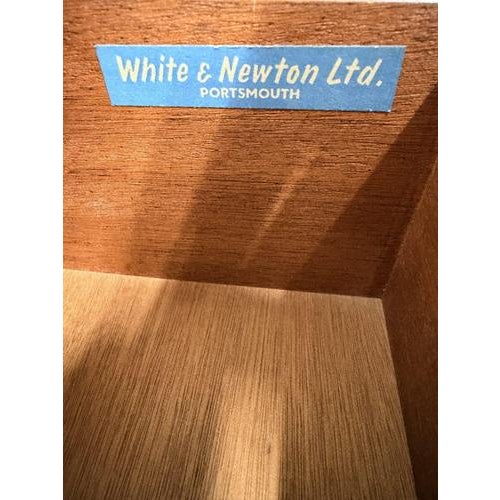 A beautifully proportioned mid-century dressing table by white & newton, finished in richly toned teak and dating to the...