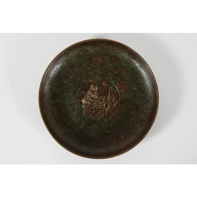 Danish Art Deco patinated bronze dish made in Denmark 1940-50. The dish has in the center a relief of a tableau from H. C....