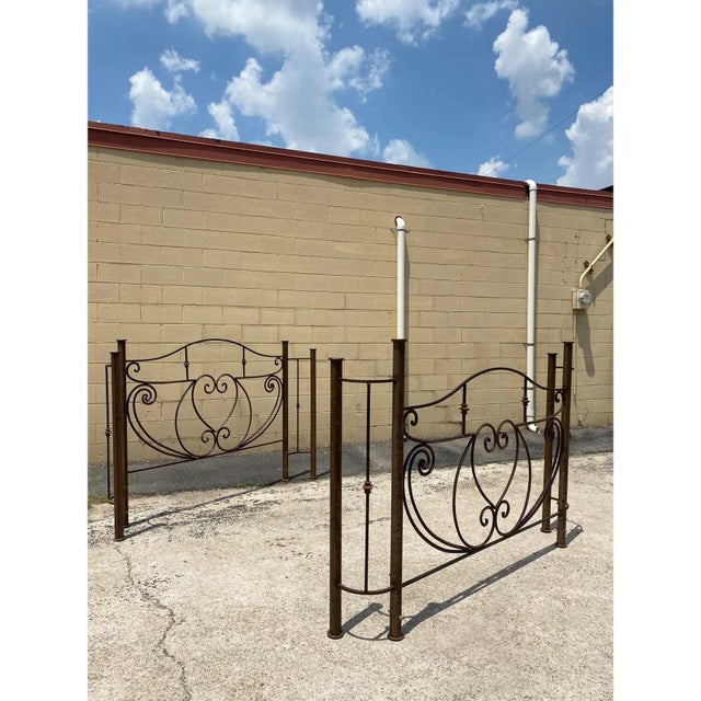 Artisan-welded steel bed frame in a romantic Art Nouveau style, purchased in the 1990s at the Round Top Antique Festival....