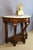 Restoration period console table with scrolled handles. Carrara marble top. This original console table, with its three...