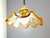 Murano Glass Hanging Lamp Made of Tulip-shaped hand-blown Murano glass in amber and clear tones, and equipped with a...