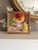 This painting is a fun and colorful still life of fruit. I enjoy the different fruit depicted and the simple way they are...