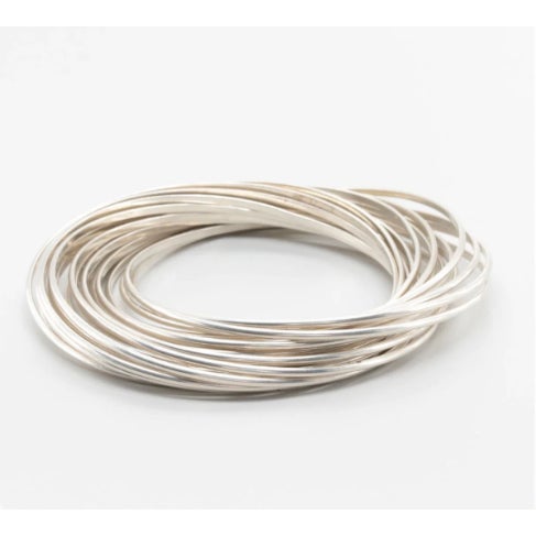 Beautiful Vintage Silpada Sterling Silver interlocking bangle. Twenty one interlocking bangles. There are faint markings...