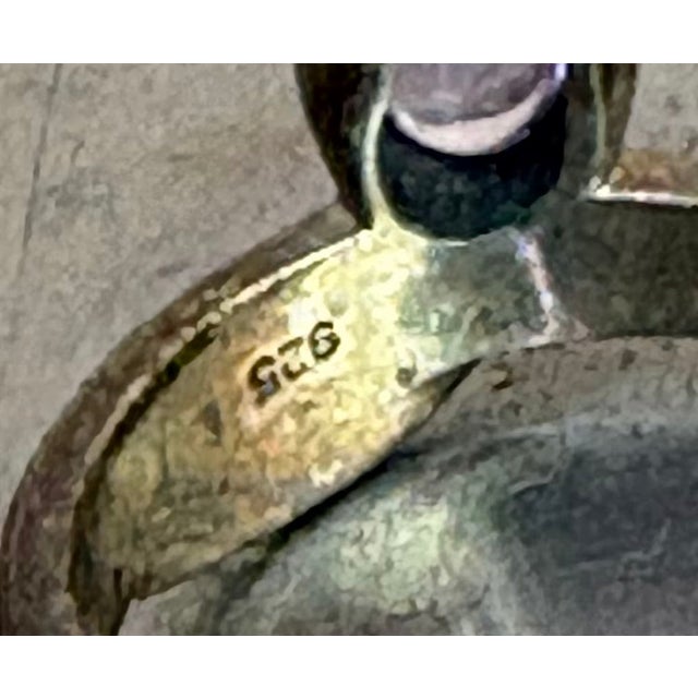 1970s-80s sterling silver & purple stone snake-style ring. Size 7.25. Excellent condition. Marked at inner band.