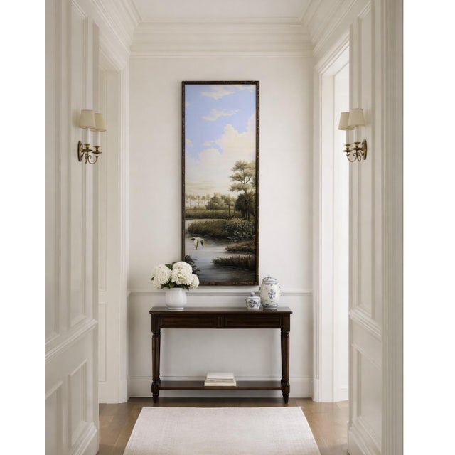 Gorgeous large framed panel of a lush Low Country marsh scene. A bird, marsh grass, trees and a blue sky set the stage for...