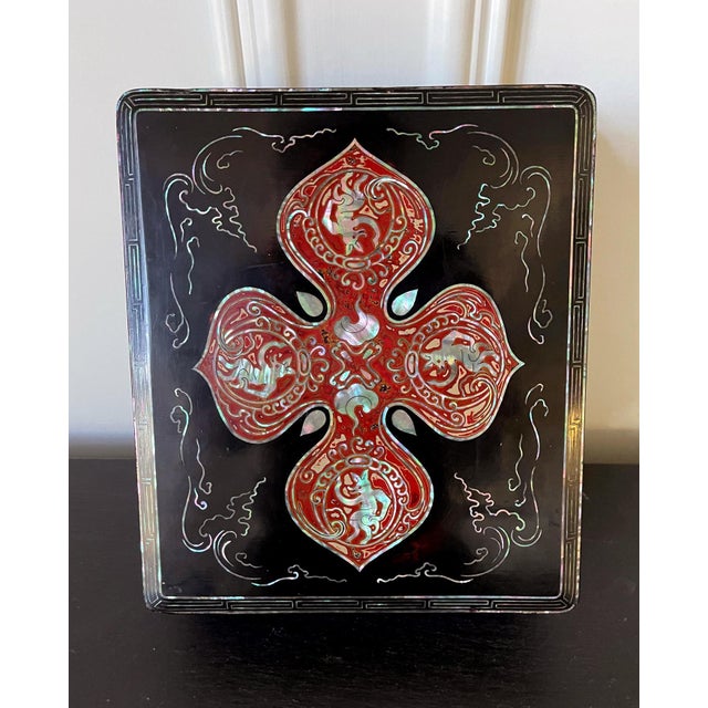A Japanese black lacquer box with mother of pearl inlays circa early 20th century, end of Meiji period. It was likely to...