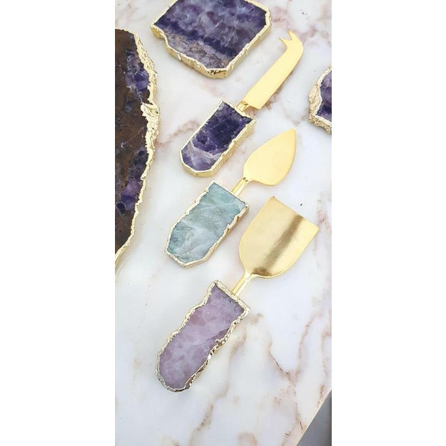 A really beautiful cheese board set in natural agate made in India. Consists of one board for cheese, three different...