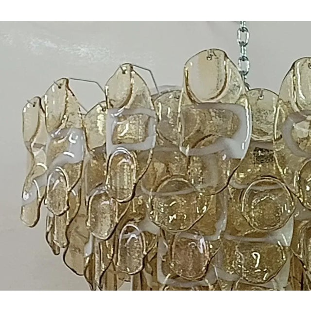 Fantastic Venetian amber and white color for a Cascade of Murano leaves. A striking color for this chandelier. All in...