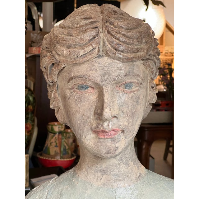 Early Vintage Folk Art Carved and Painted Bust from French Indonesia, early to mid 20th Century, a hand carved and painted...