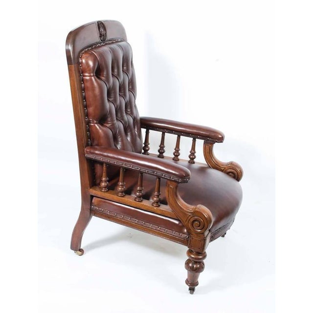 This is a handsome pair of antique Victorian mahogany and leather club armchairs, circa 1880 in date. This lovely pair was...