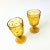 A set of 2 vintage amber cocktail goblets. Beautiful ornate design to the glass.