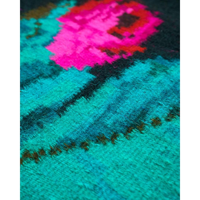 Oversized vintage Romanian 100% wool runner / gallery-size rug with a rich folk floral composition on a dramatic deep dark...