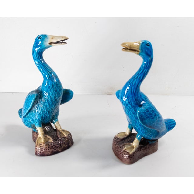 We are selling this nice decorative pair of Turquoise Blue and Aubergine Purple glazed ducks. These ducks are probably...
