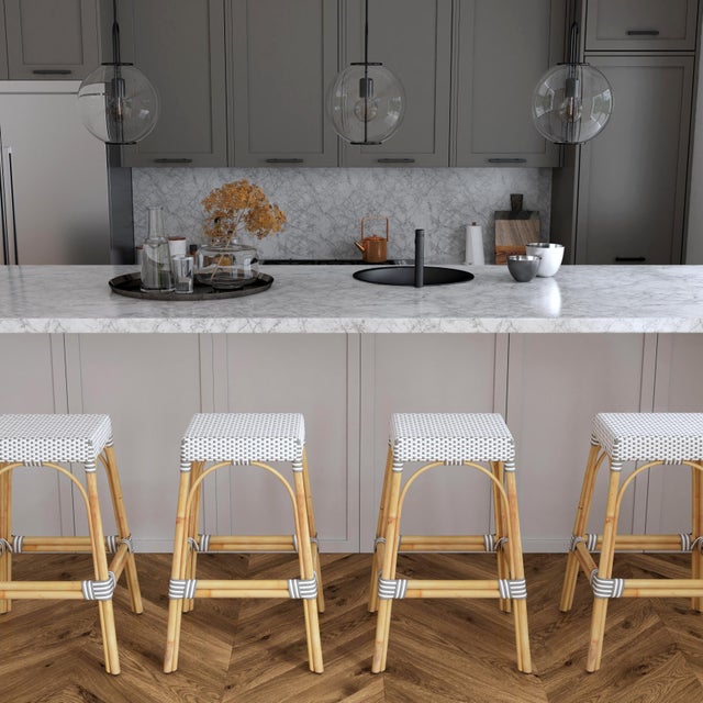 This backless stool measures 30" high, so it sits at just the right height for your bar seating. It has an intricately...