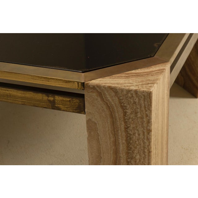 This coffee table was produced in Italy during the 1970s and reflects the material-driven aesthetic of the period. The...