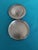 An elegant vintage silver trinket box featuring a circular form, decorative fluted design, and hinged lid. Measuring...