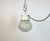 Vintage industrial light made in former Czechoslovakia during the 1970s. It features a white porcelain top and a glass...