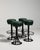 Rooted in the refined sensibility of 1970s French design, this distinguished set of four bar stools unites robust wrought...