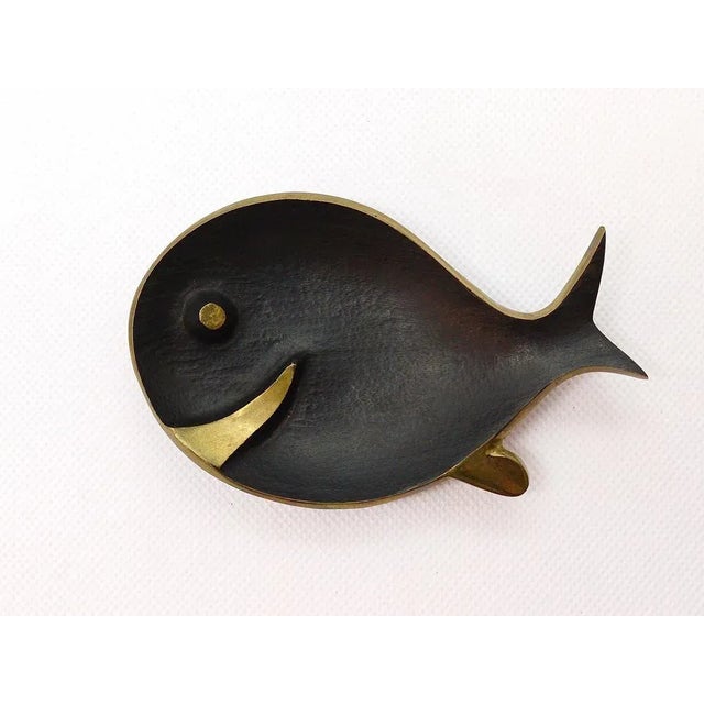 A charming modernist bowl or ashtray in the shape of a fish. A very humorous design by Walter Bosse, executed by Hertha...