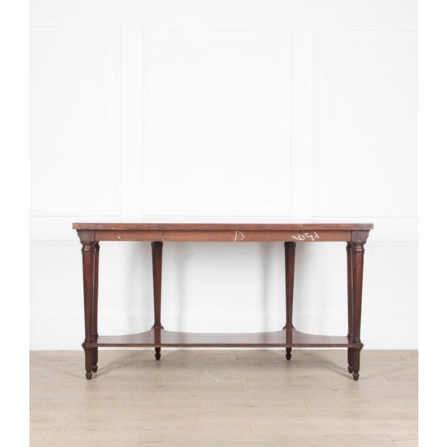 Regency Mahogany Serving Table of very unusual form. with rounded ends and moulded frieze. Raised on six tapering...