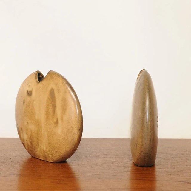 A pair of vintage mid-century brown fish and flower ceramic vases ‘the kings of majorca france’ from the 1970s....